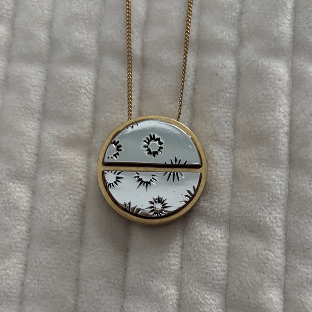 Gold and Silver Adjustable 
Pendant Necklace